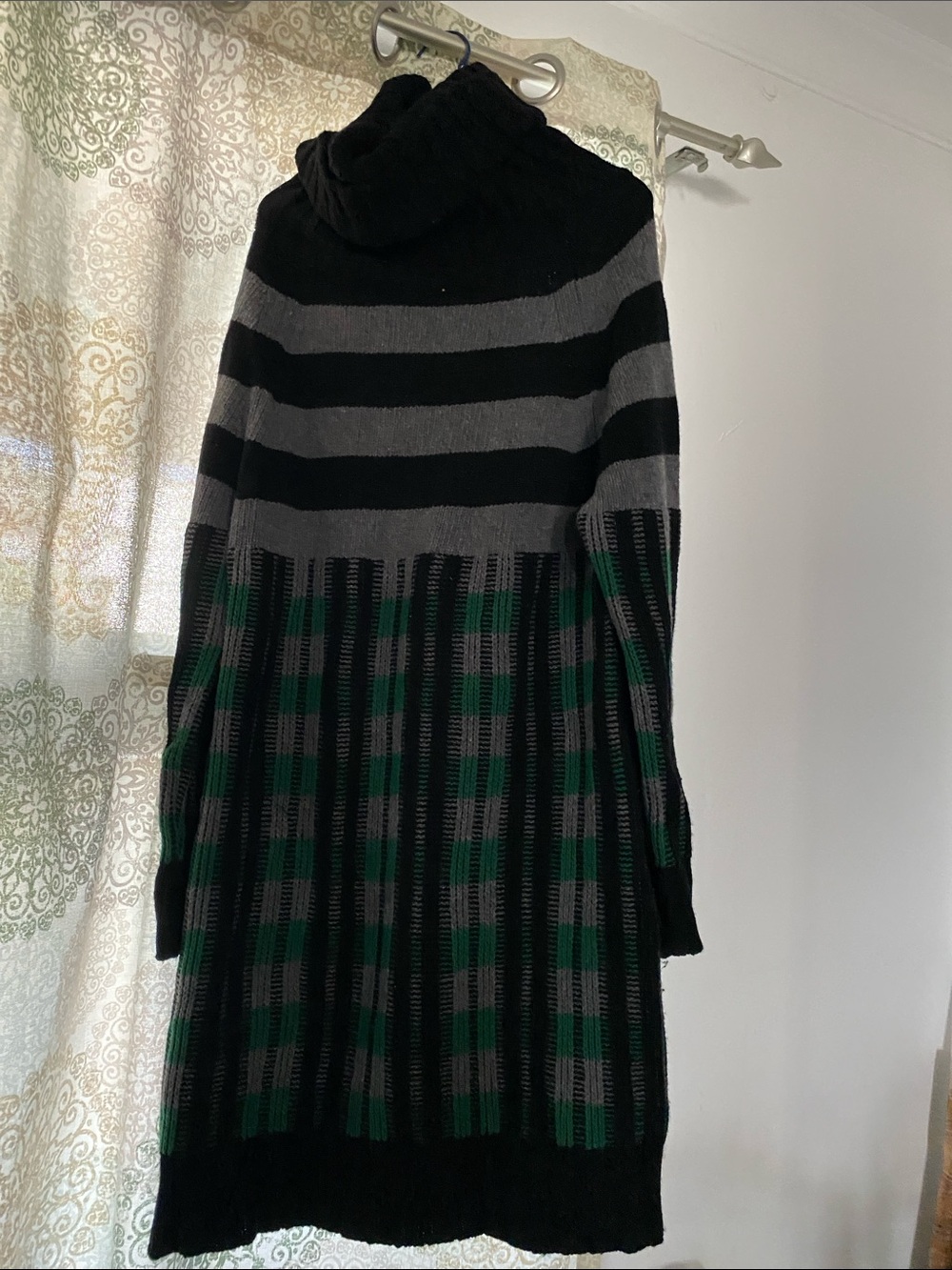 Label-only image of women's sweater